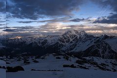 05A Panoramic View Of Garabashi Camp 3730m At Sunset With Mounts Kavkaza, Donguz-Orun, Cheget, Shdavleri On Mount Elbrus Climb